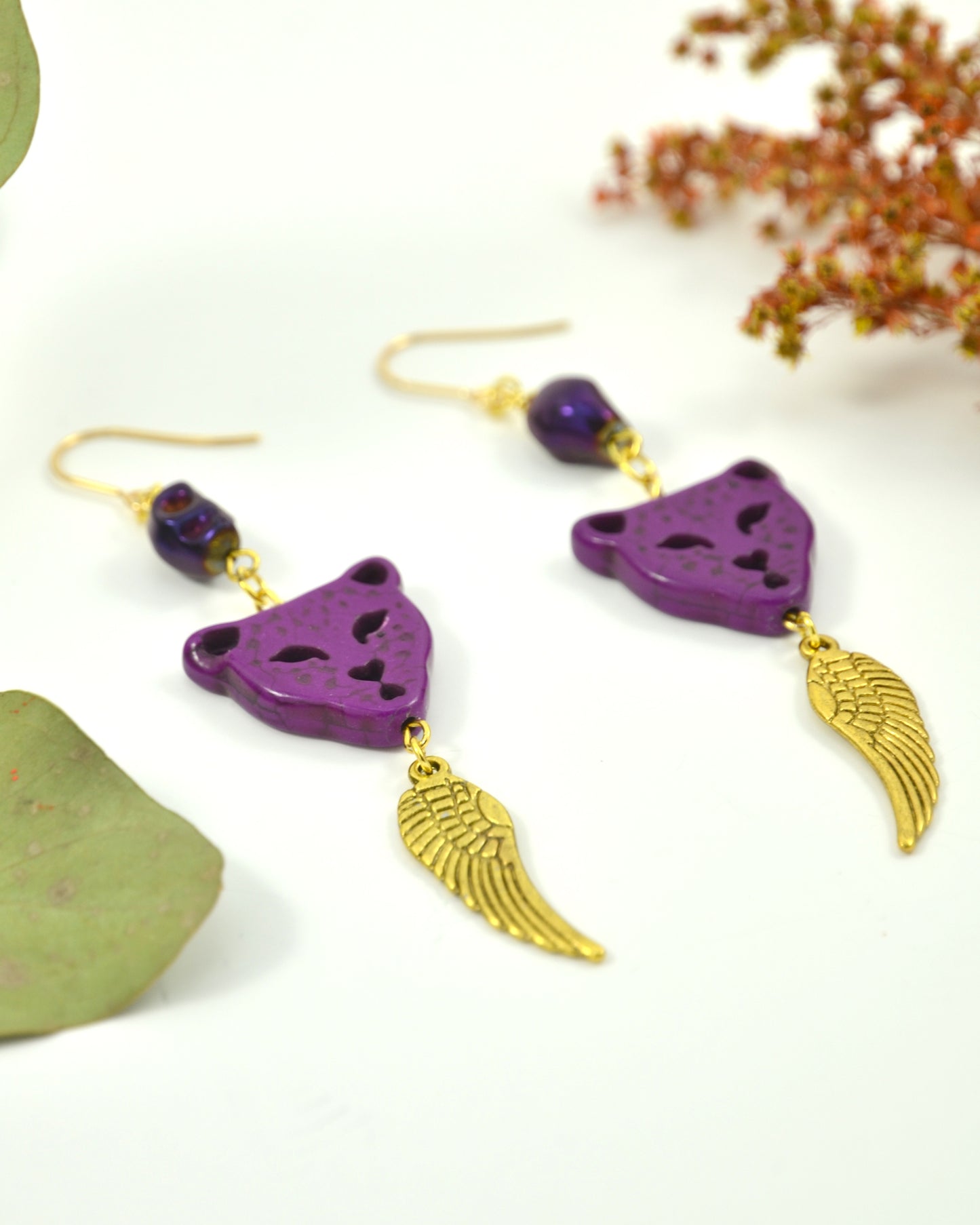 Purple Leopard Feather dangling earrings